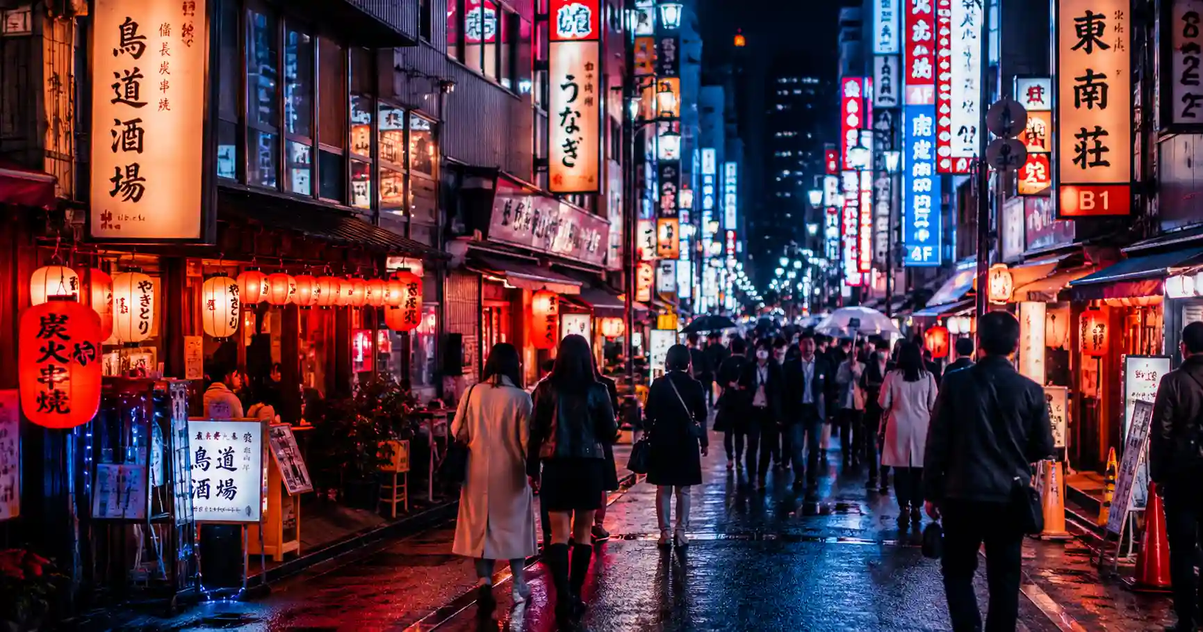 Busy Shinjuku street in Tokyo at night with neon signs
